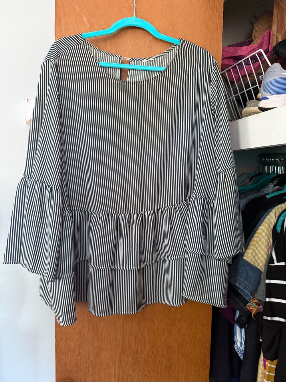 Women’s Black and White Striped Peplum Blouse